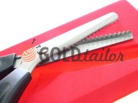 Shears tailors zig-zag with a plastic handle and a self-sharpening blades Shears tailors zig-zag with a plastic handle and a self-sharpening blades